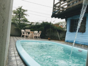 Biocasa com piscina a 1 quadra e meia da Praia